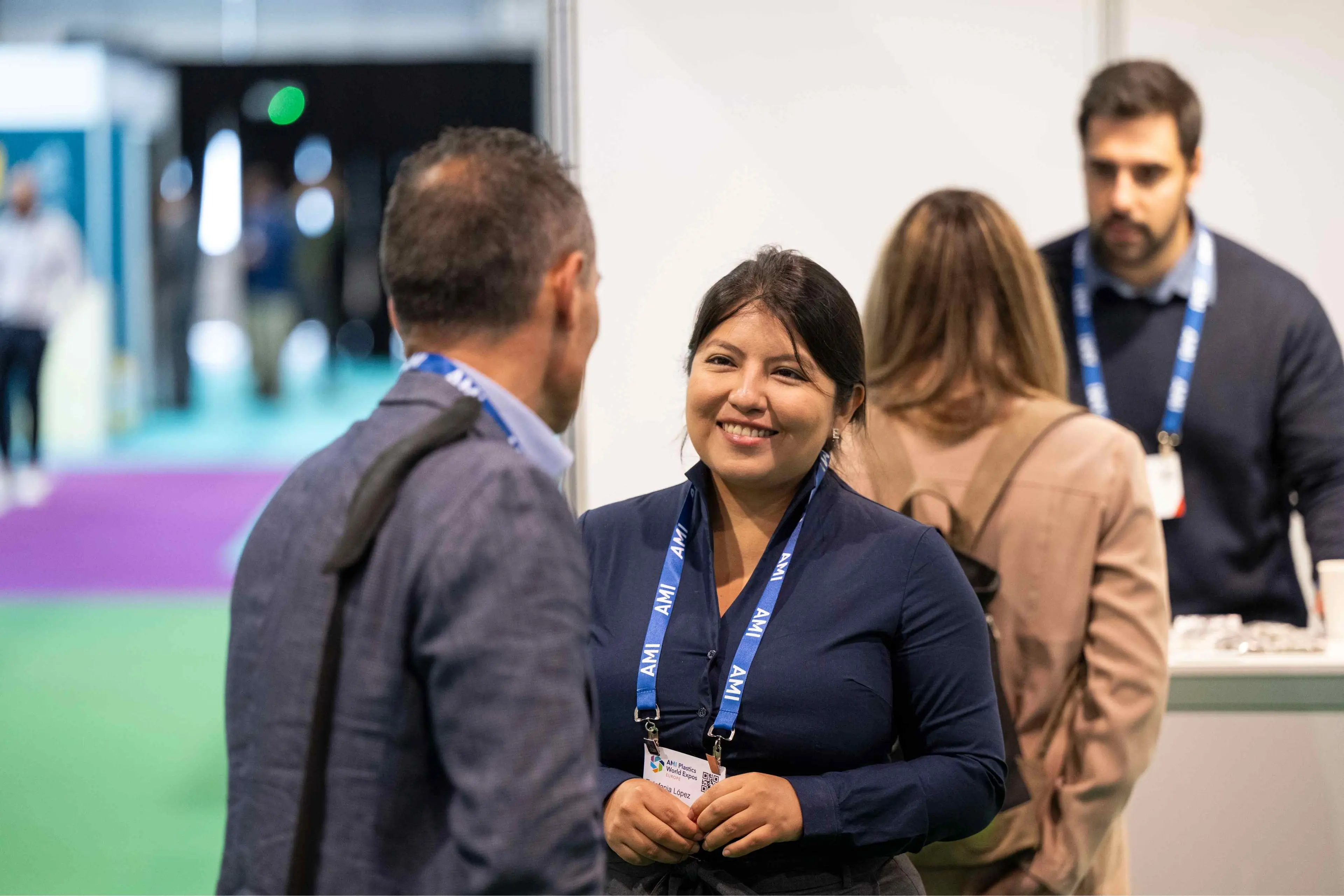 Discussions on show floor at AMI expo