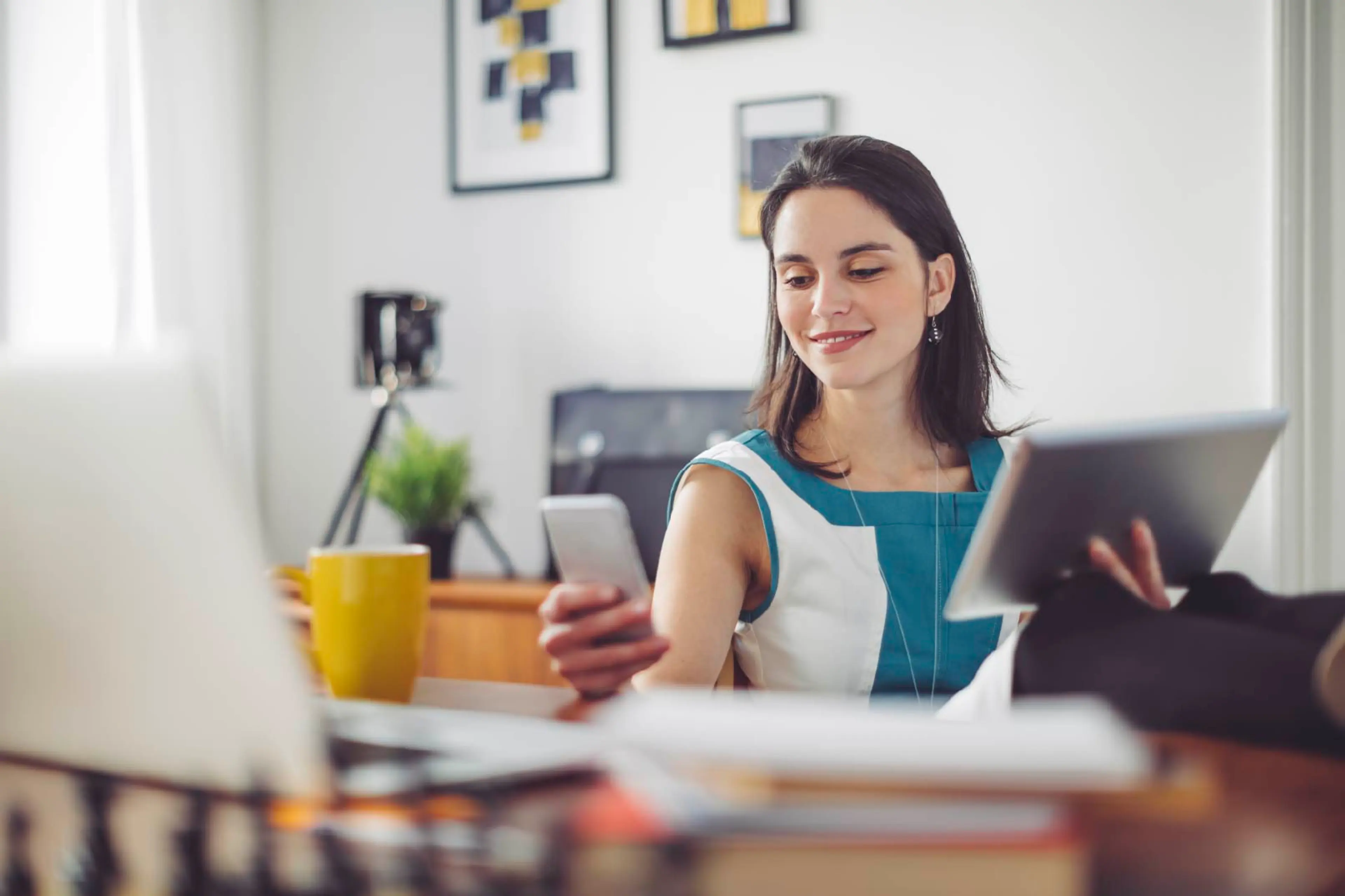 lady reading ipad phone laptop