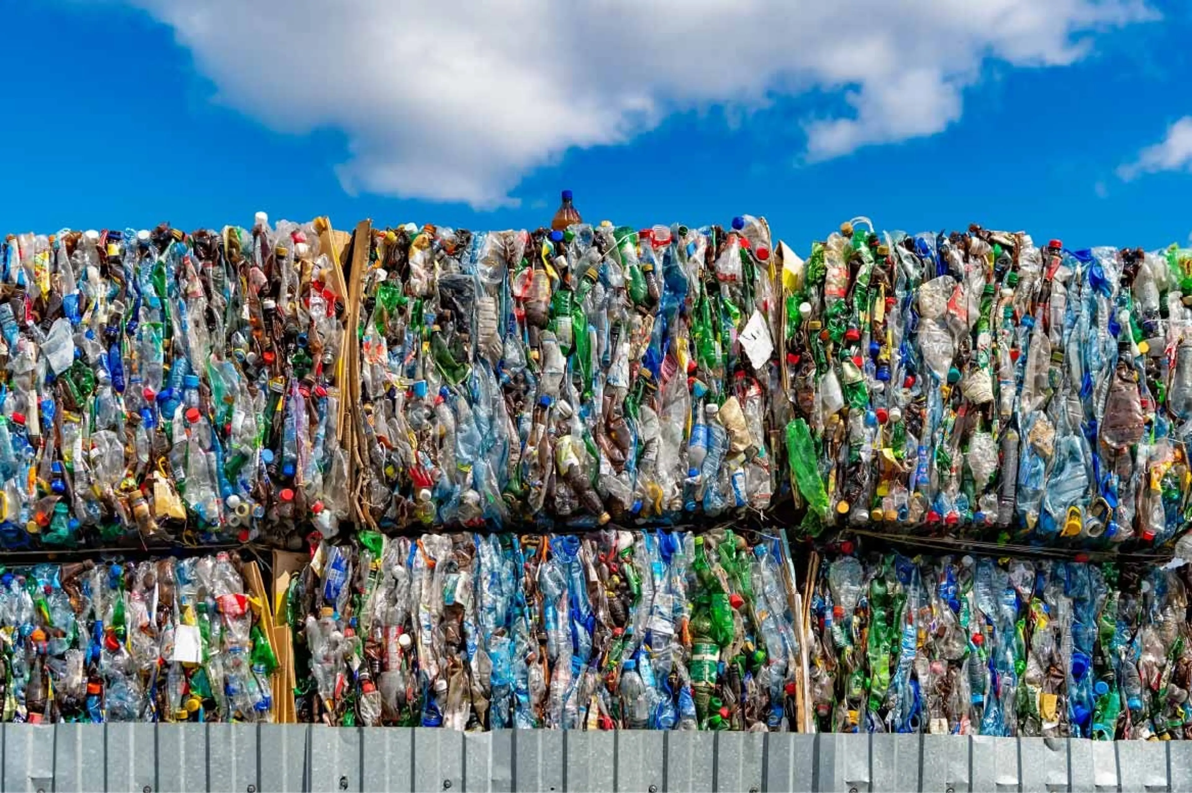 Plastics bottles in bales ready for recycling
