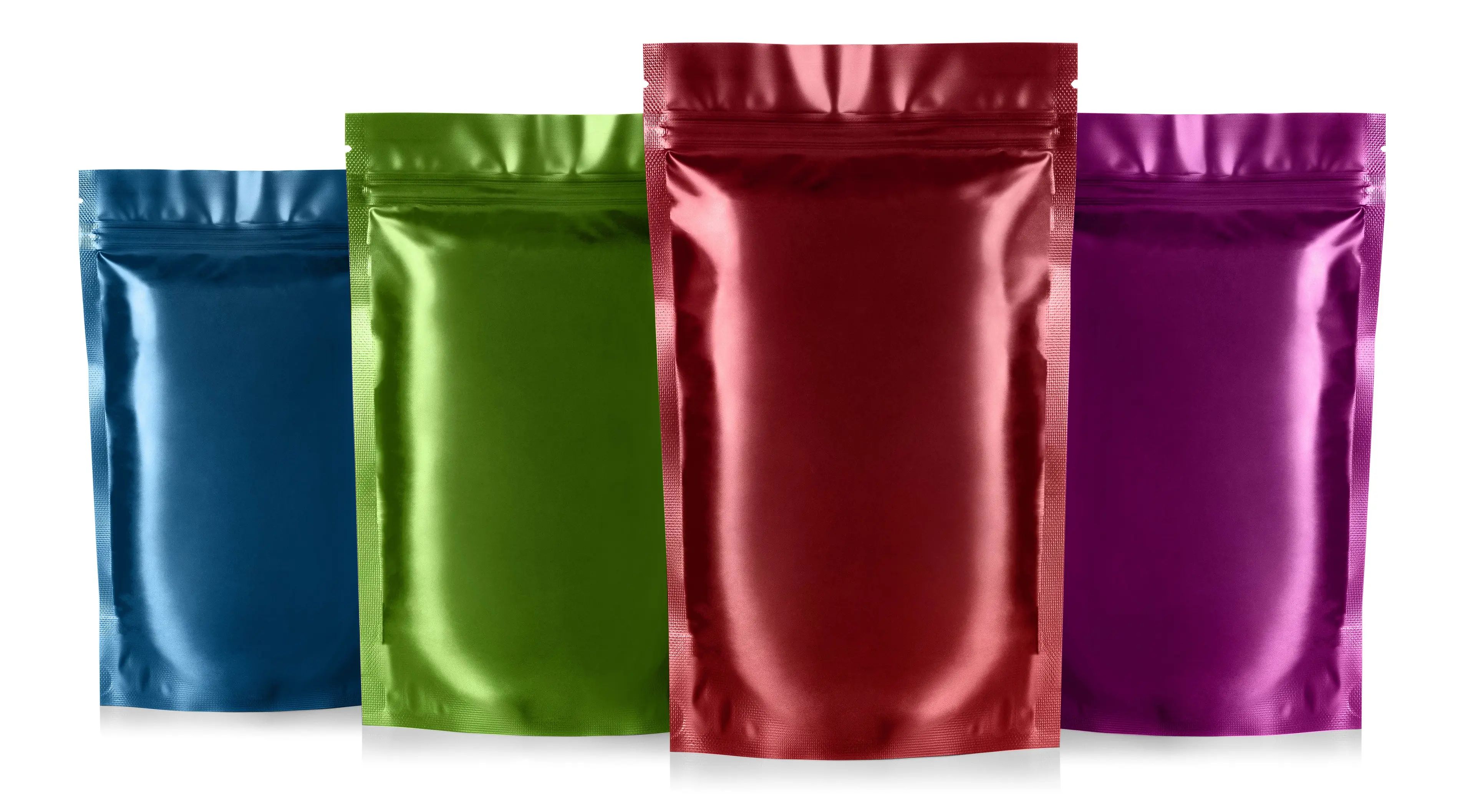 Foiled food pouches on a white background